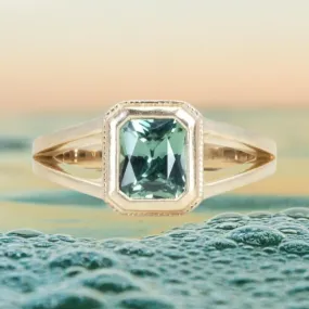 1.20ct Radiant Cut Seafoam Montana Sapphire Split Shank Bezel Ring with Milgrain in 14k Yellow Gold