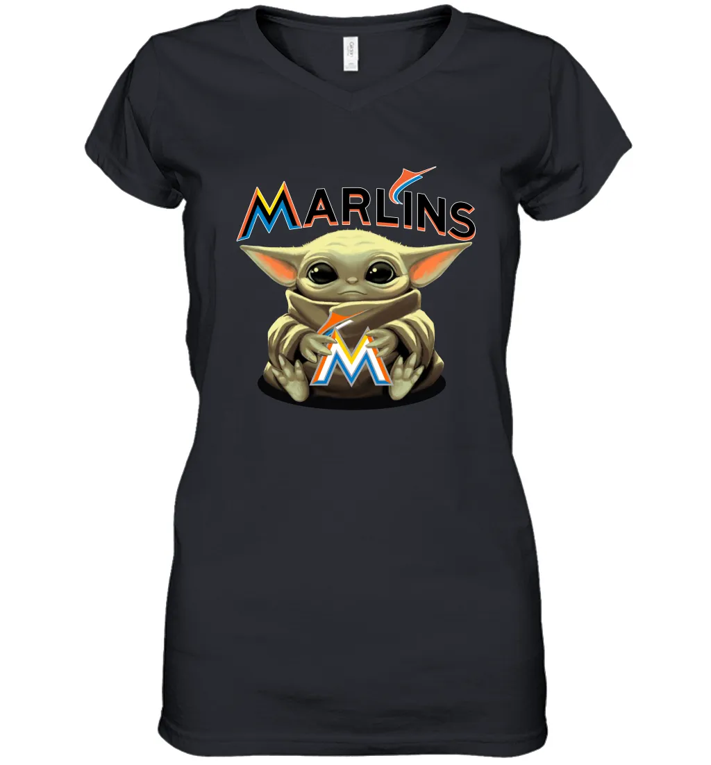 Baby Yoda Hugs Loves The Miami Marlins Baseball Womens V-Neck T-Shirt