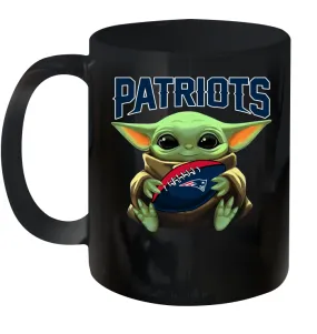 Baby Yoda Loves The New England Patriots Star Wars Baby Yoda Hugs Patriots NFL Ceramic Mug 11oz