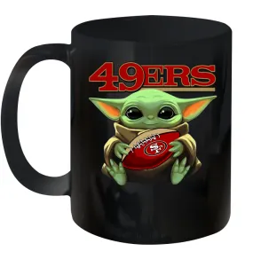 Baby Yoda Loves The San Francisco 49ers Star Wars Baby Yoda Hugs 49ers NFL Ceramic Mug 11oz